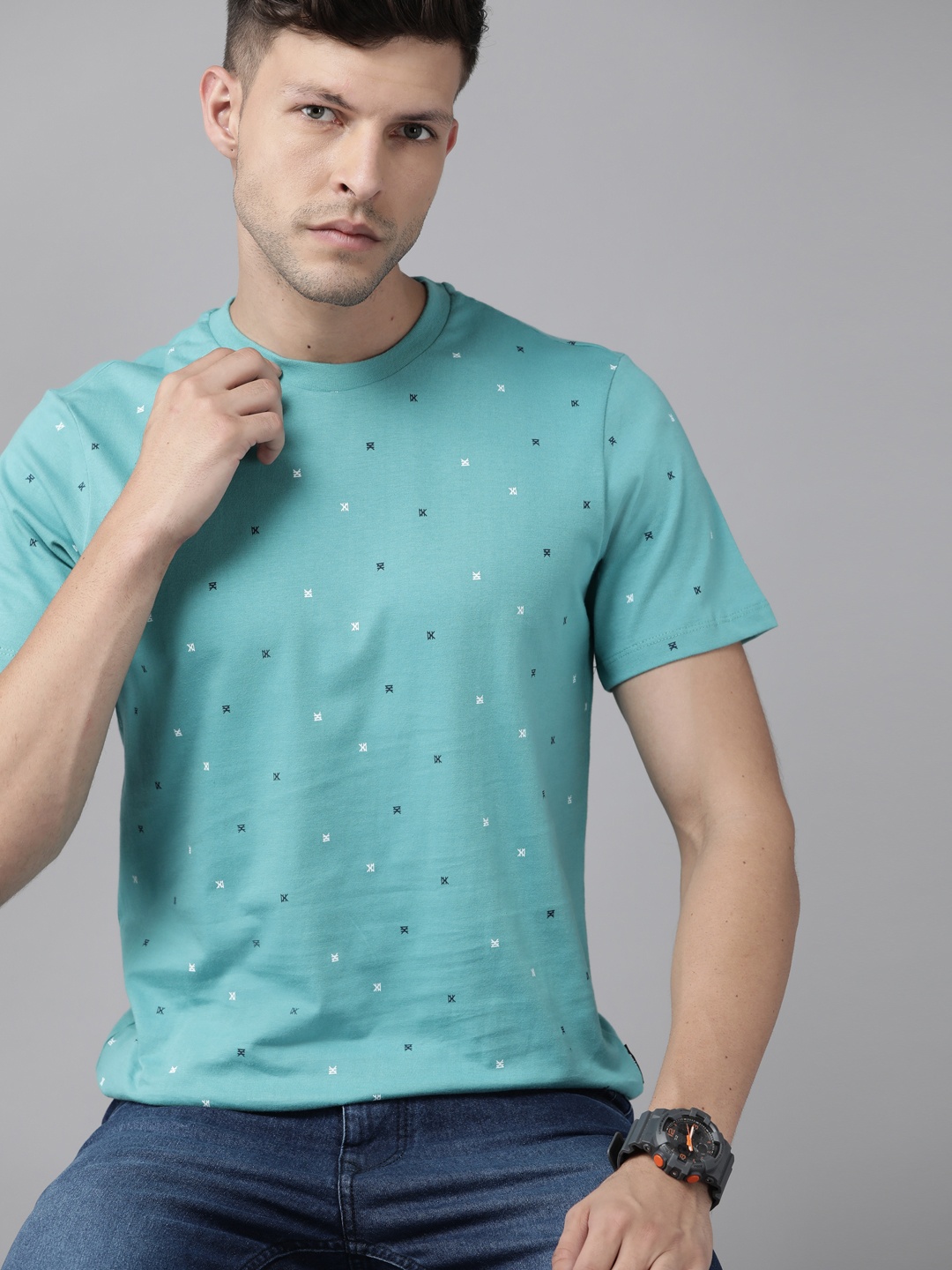 

Roadster Men Sea Green & White Geometric Printed Pure Cotton T-shirt