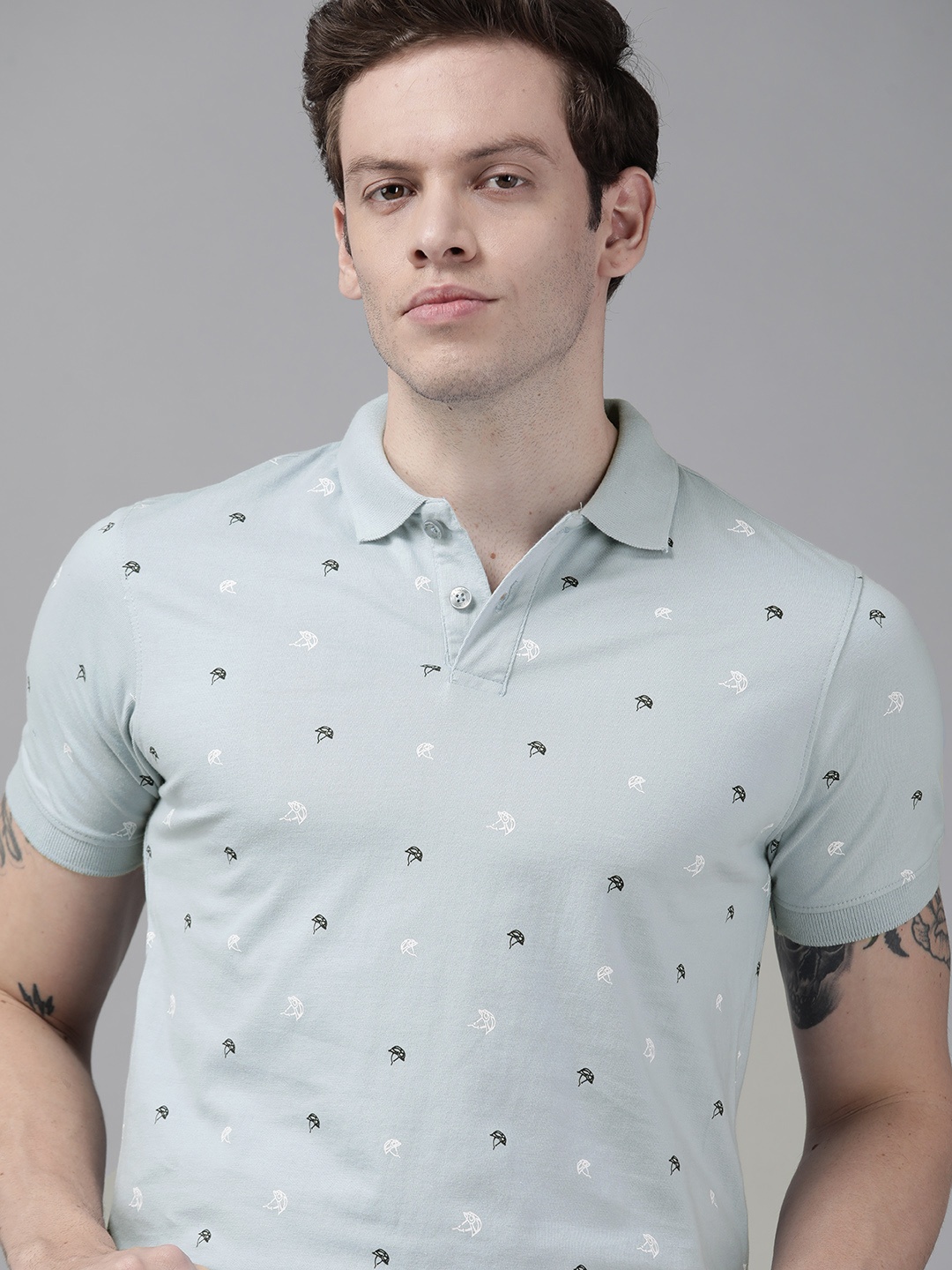 

Roadster Men Blue & Black Conversational Print Polo Collar Pure Cotton T-shirt