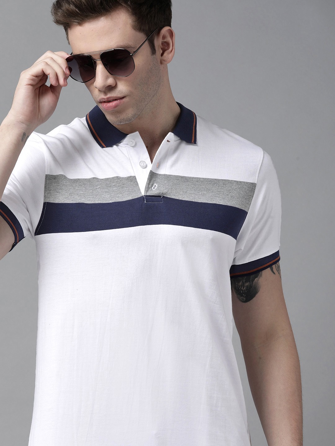 

Roadster Men White & Navy Blue Striped Polo Collar Pure Cotton T-shirt