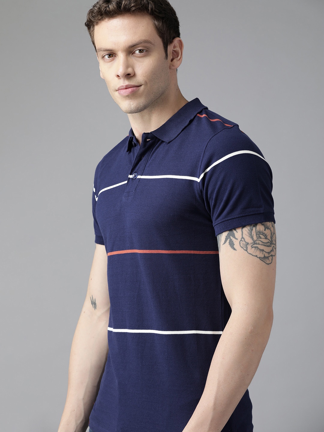 

Roadster Men Navy Blue Striped Polo Collar Pure Cotton T-shirt