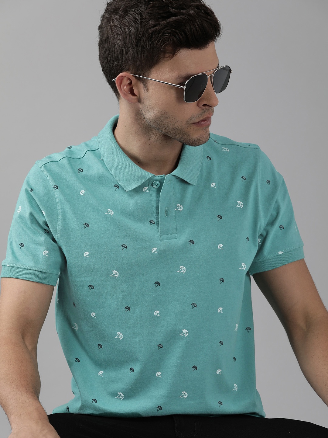

Roadster Men Turquoise Blue & White Nautical Printed Polo Collar Pure Cotton T-shirt