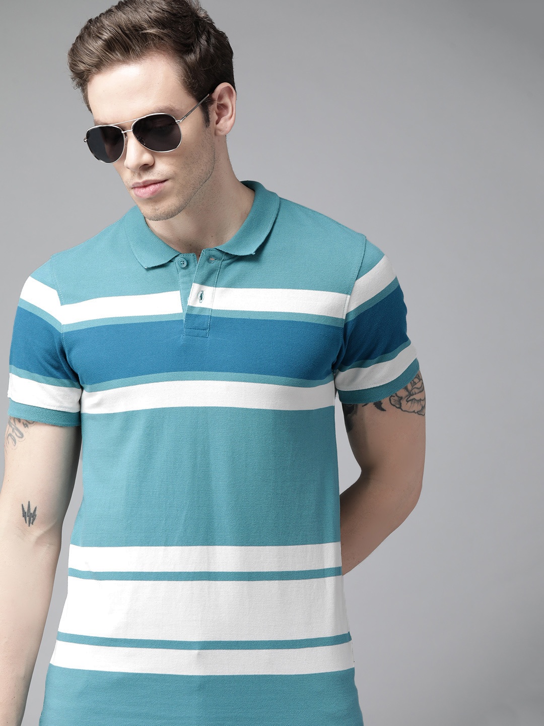 

Roadster Men Sea Green & White Striped Polo Collar Pure Cotton T-shirt