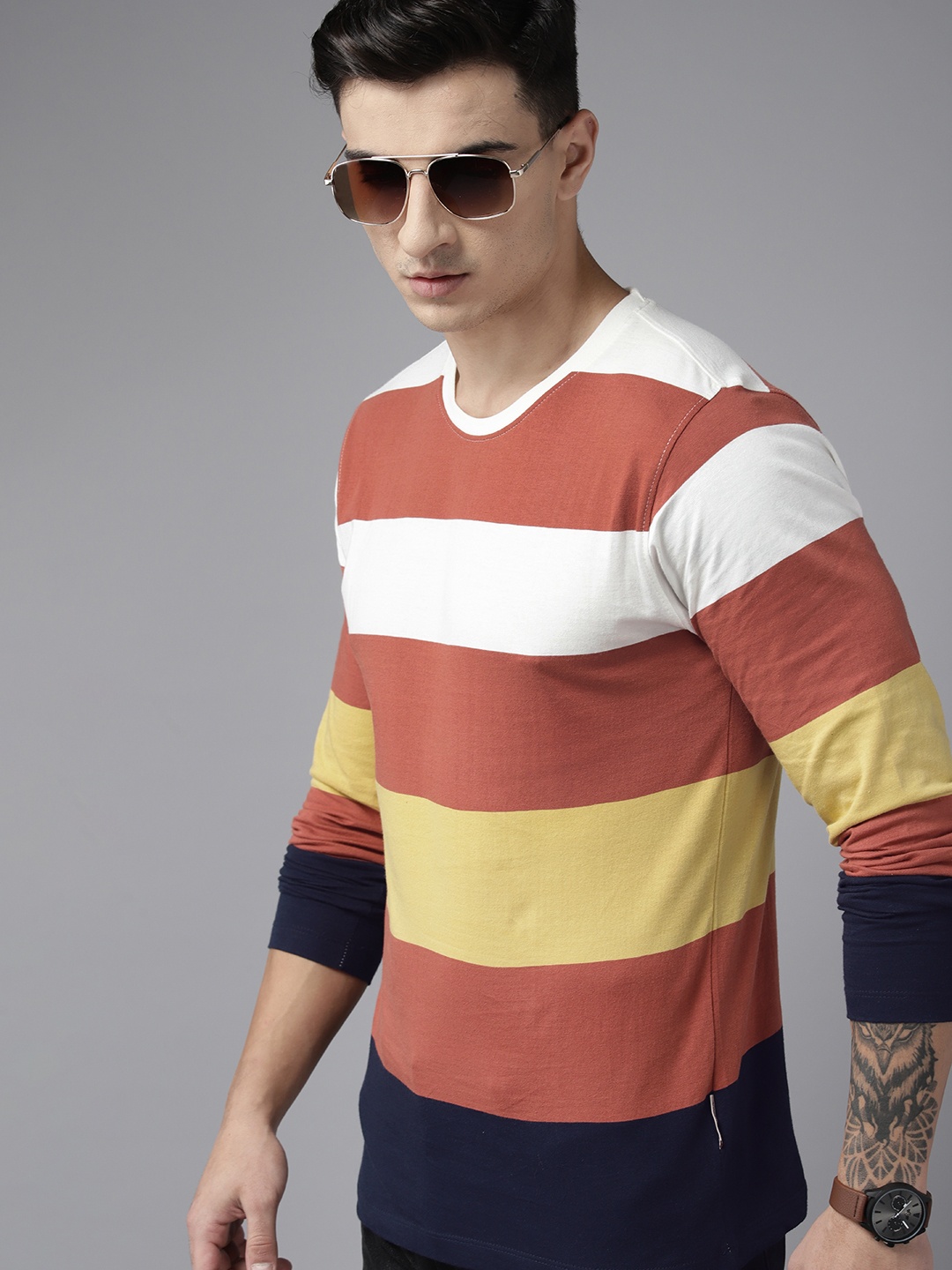 

The Roadster Lifestyle Co. Men Striped Pure Cotton T-shirt, Coral