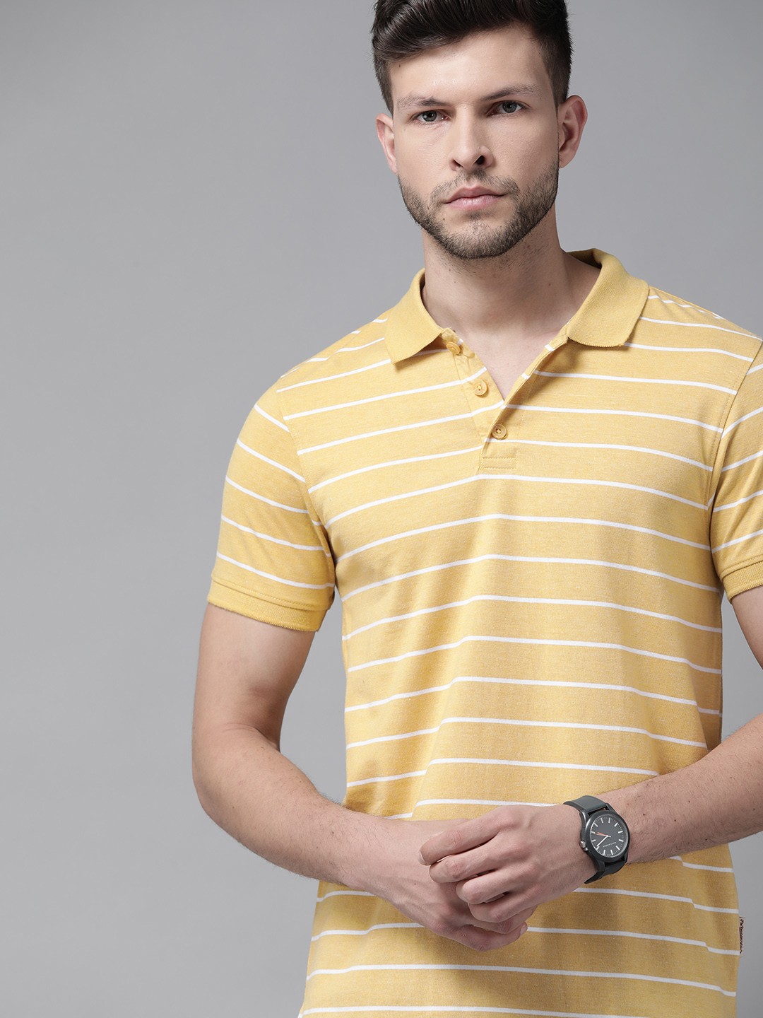 

Roadster Men Yellow & White Striped Polo Collar T-shirt