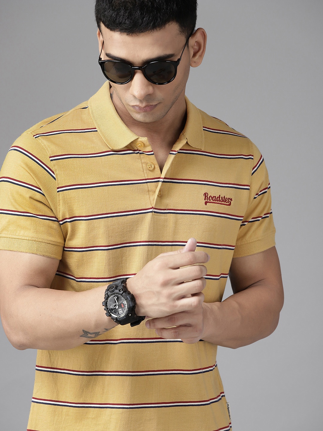 

Roadster Men Yellow & Navy Blue Pure Striped Polo Collar T-shirt