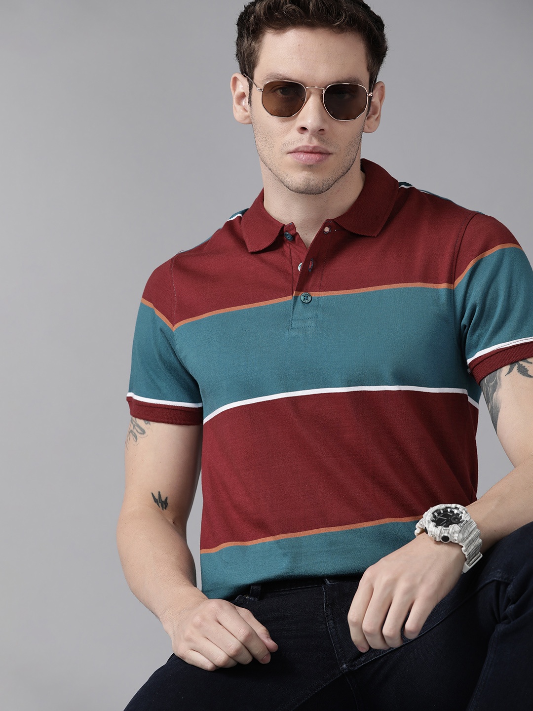 

Roadster Men Maroon & Teal Blue Striped Polo Collar Pure Cotton T-shirt