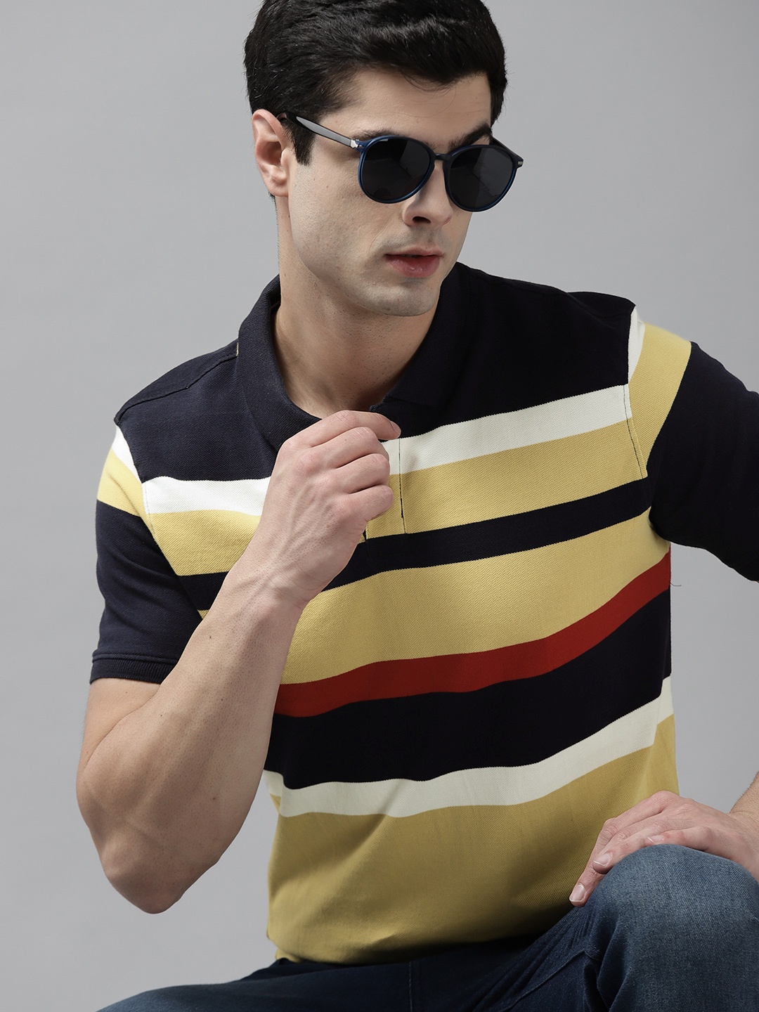 

Roadster Men Mustard Yellow & Navy Blue Striped Polo Collar Pure Cotton T-shirt