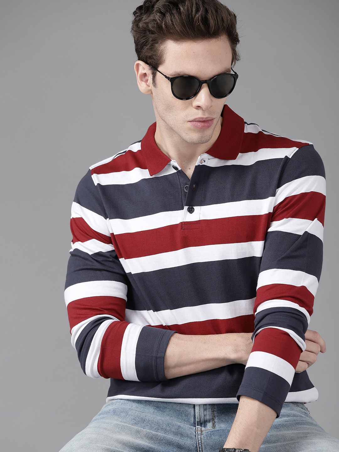 

Roadster Men Navy Blue & Maroon Pure Cotton Striped Polo Collar T-shirt