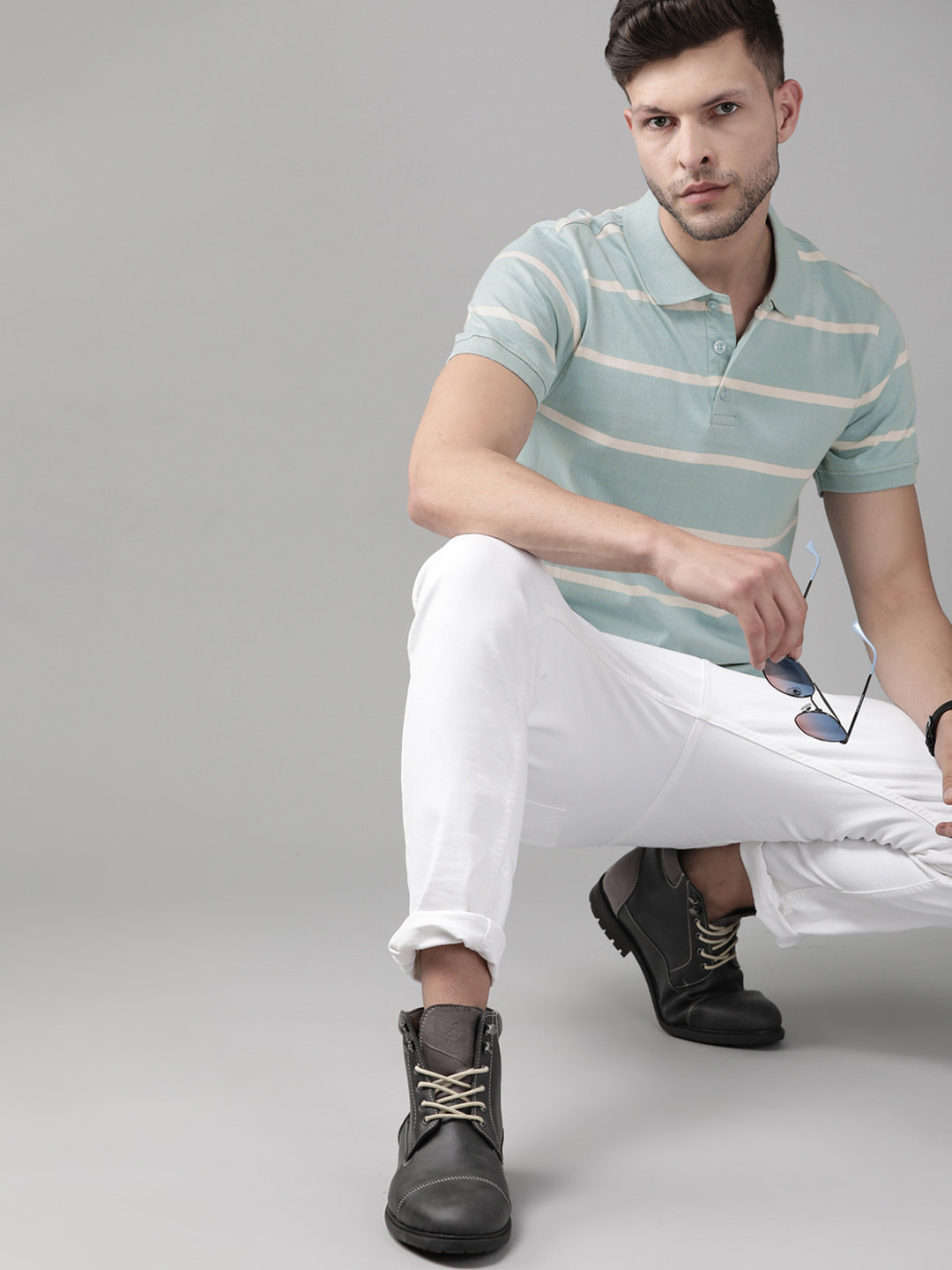 

Roadster Men Blue & White Striped Polo Collar Pure Cotton T-shirt