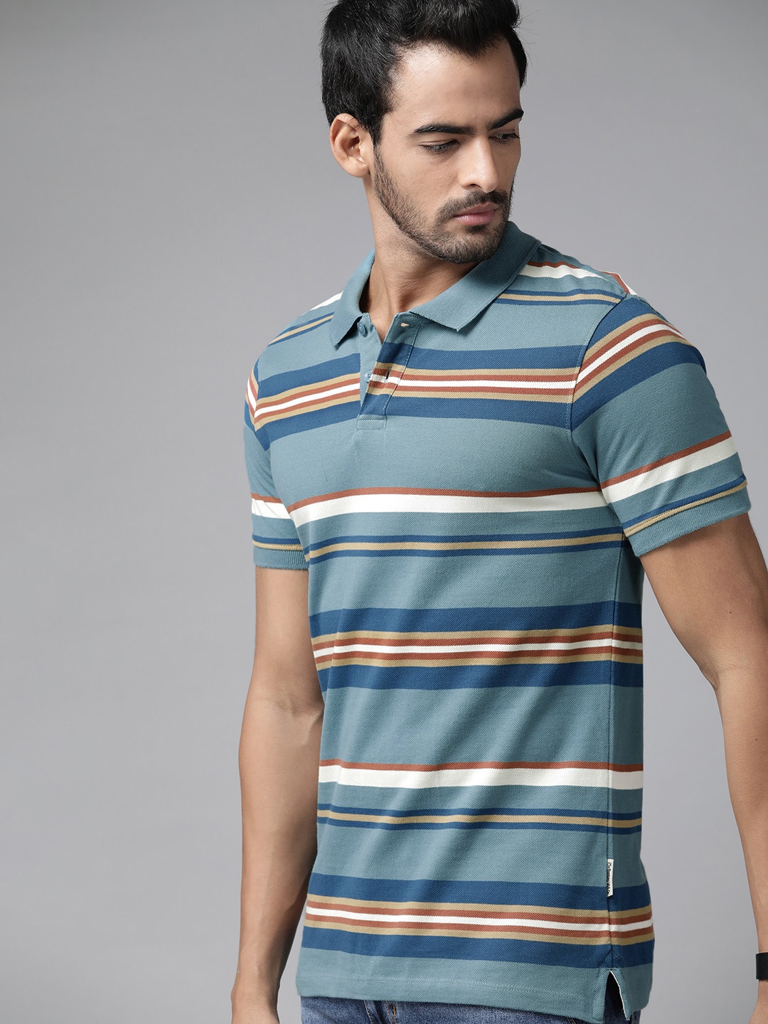 

Roadster Men Teal & Blue Striped Polo Collar Pure Cotton T-shirt