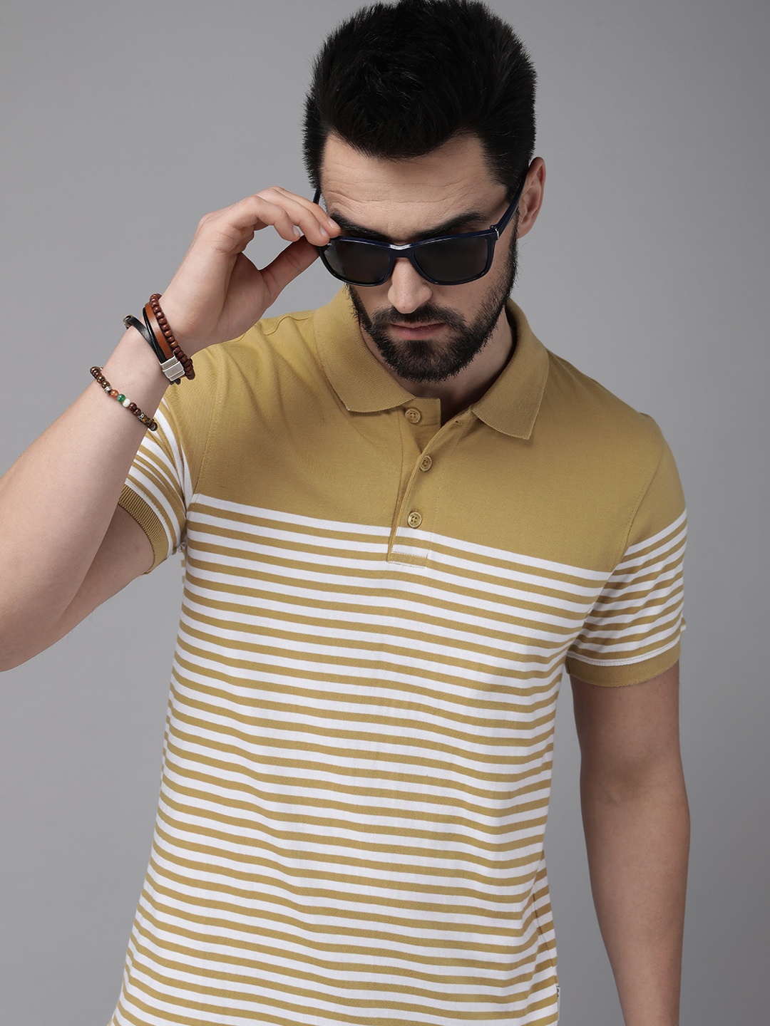 

The Roadster Lifestyle Co. Men Mustard Yellow & White Pure Cotton Striped T-shirt