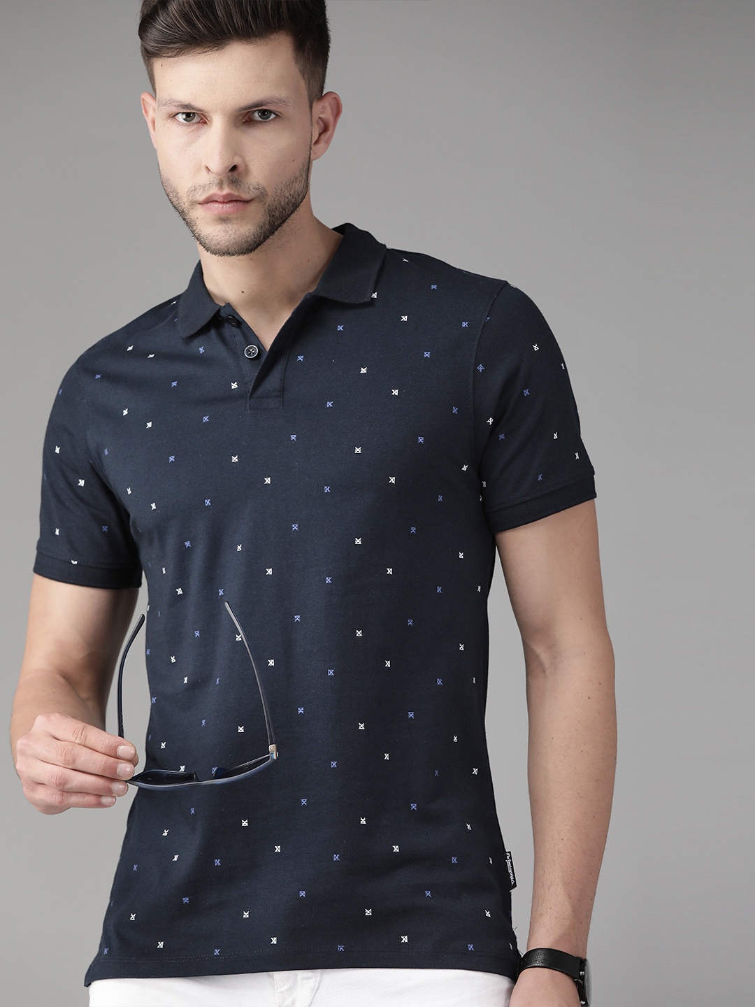 

Roadster Men Navy Blue Geometric Printed Polo Collar Pure Cotton T-shirt