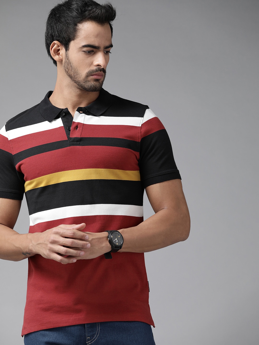 

Roadster Men Maroon and Black Pure Cotton Striped Polo Collar T-shirt