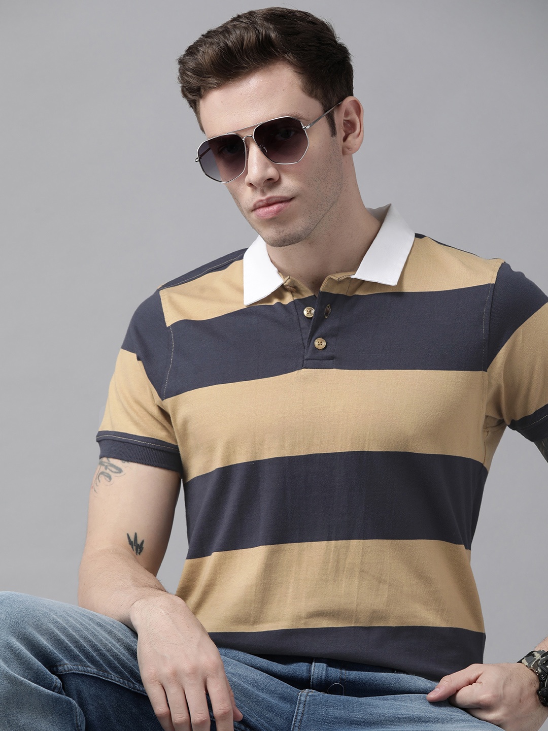 

Roadster Men Navy Blue & Beige Striped Polo Collar Pure Cotton T-shirt