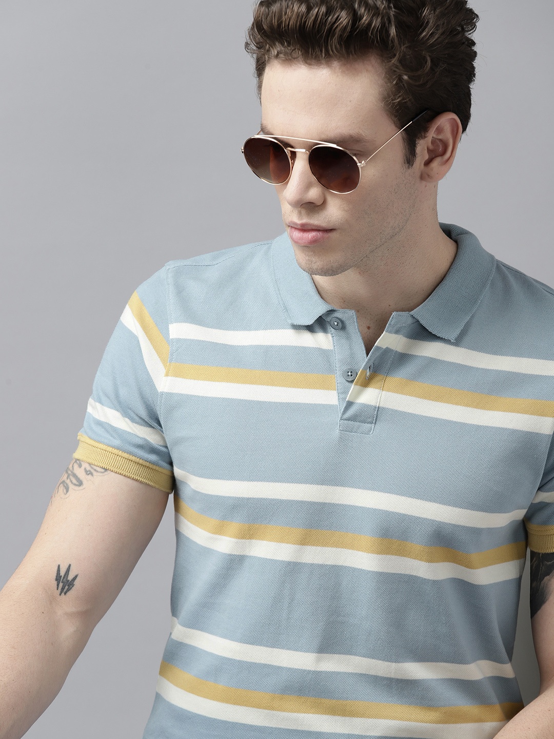 

Roadster Men Blue & Off White Striped Polo Collar Pure Cotton T-shirt