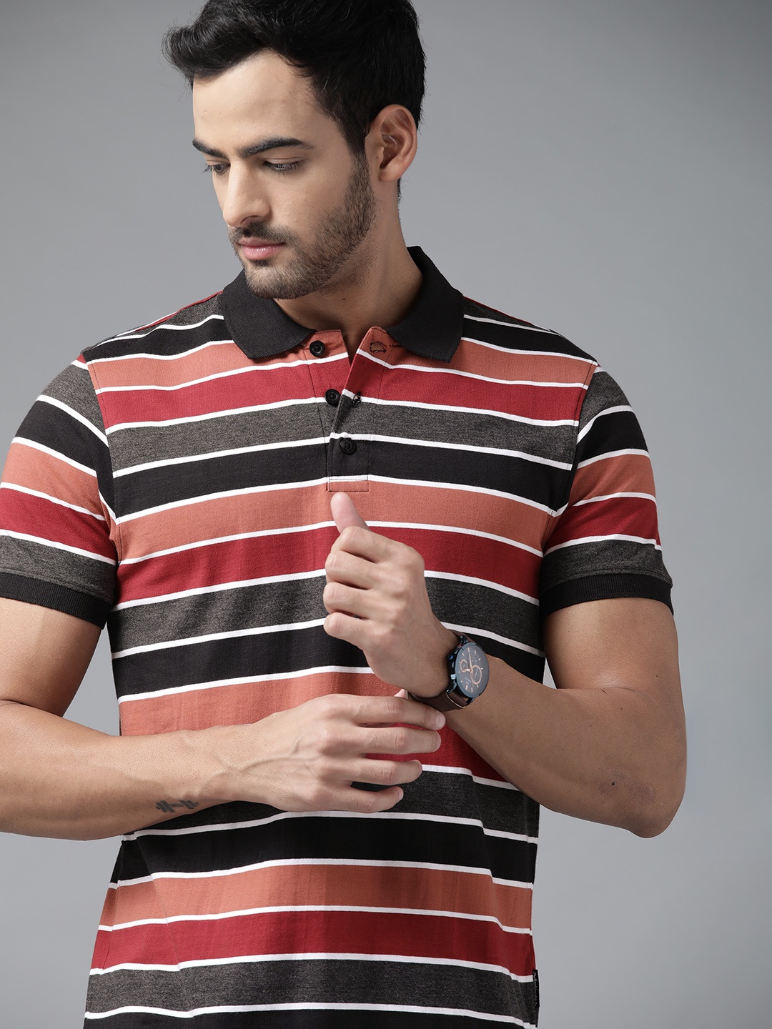 

Roadster Men Black & Maroon Striped Polo Collar T-shirt