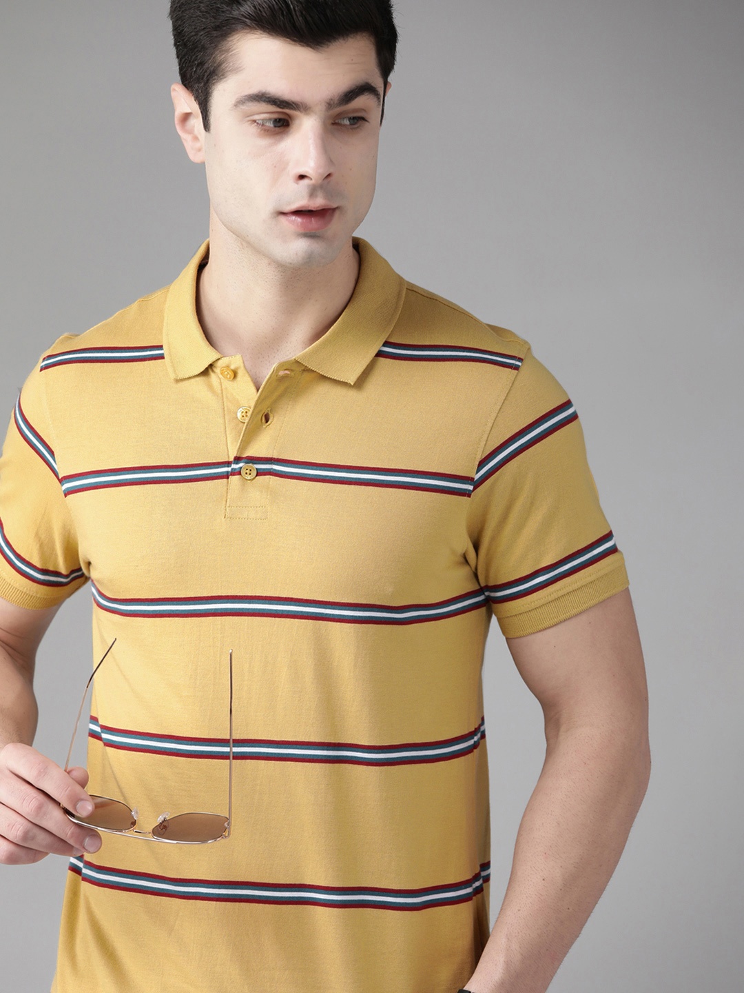 

Roadster Men Beige & Maroon Striped Polo Collar Pure Cotton T-shirt