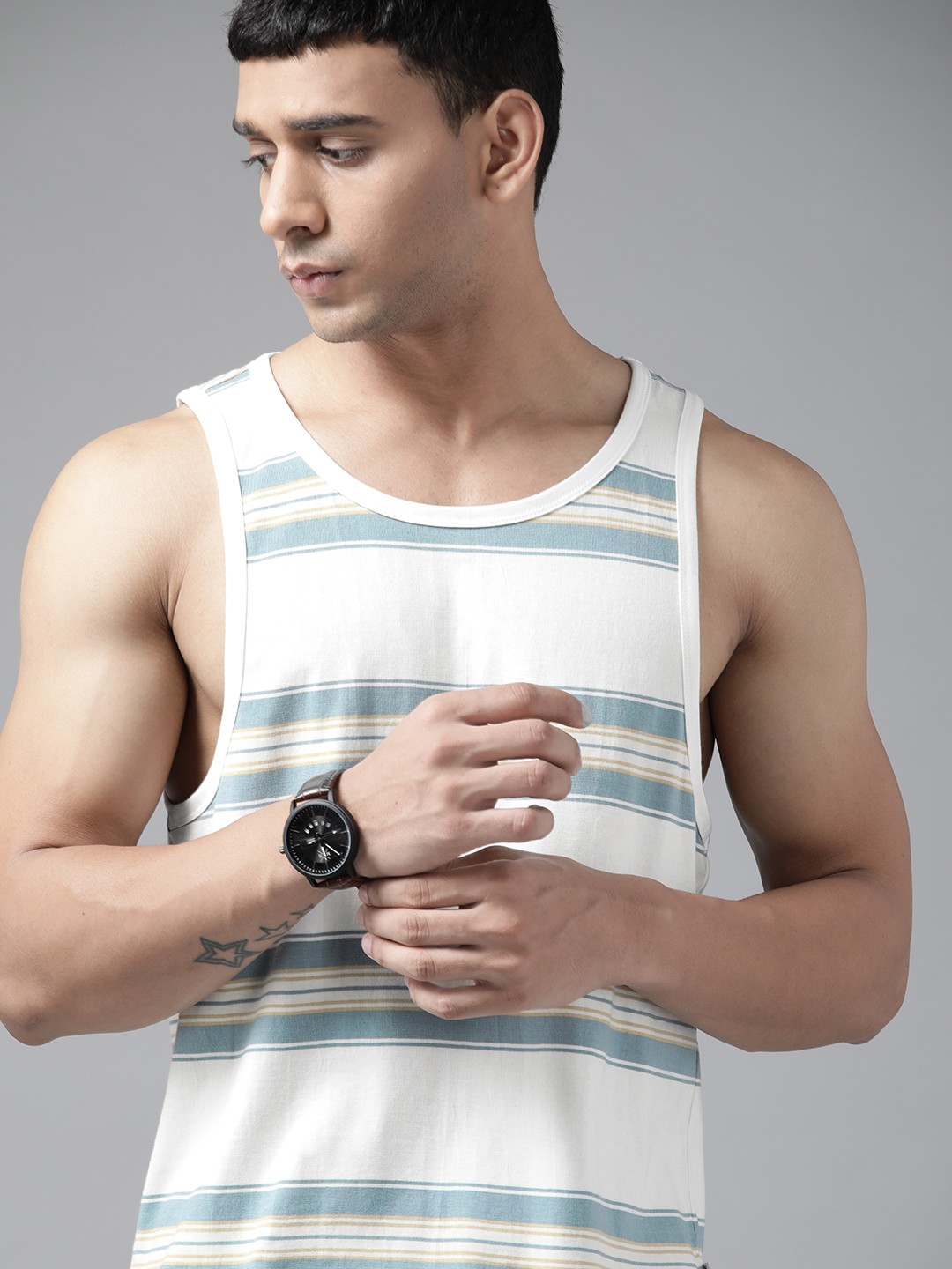 

Roadster Men White & Blue Striped Pure Cotton T-shirt