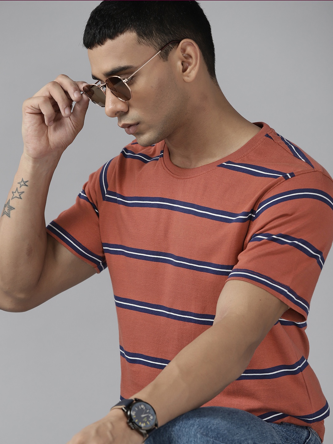 

Roadster Men Rust Orange & Navy Blue Striped Pure Cotton T-shirt