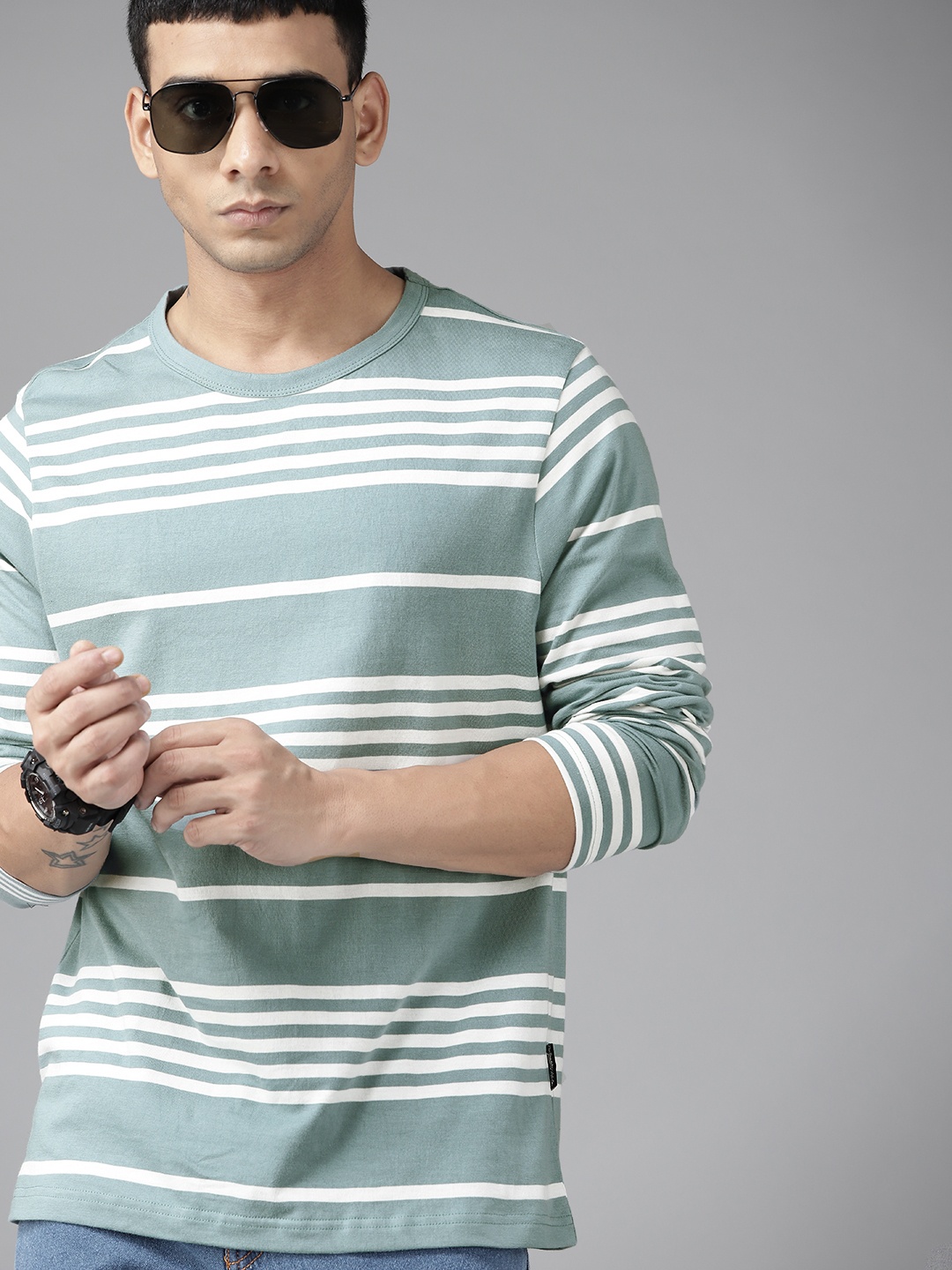 

Roadster Men Green & White Striped Pure Cotton T-shirt