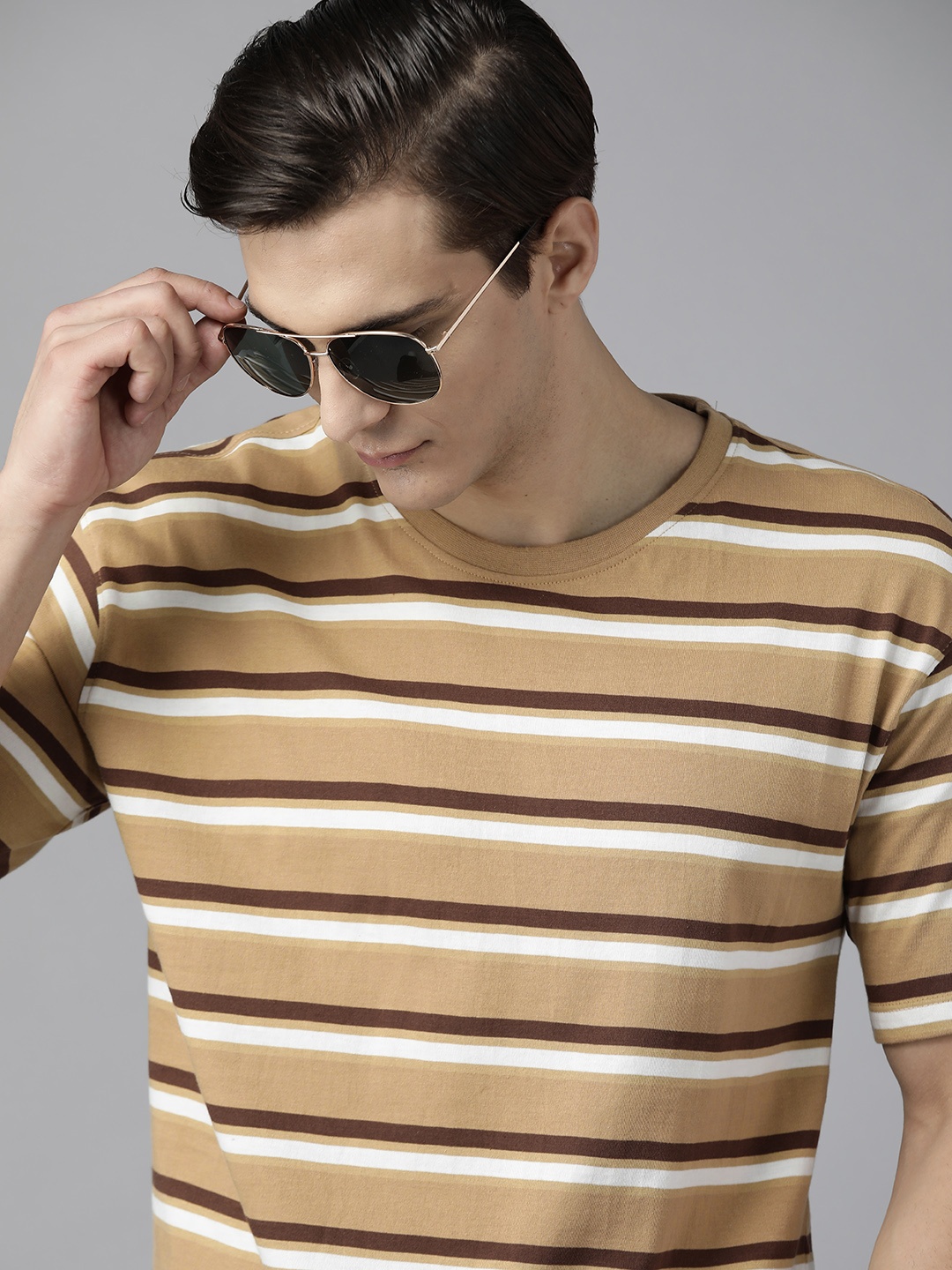 

Roadster Men Khaki & White Striped Pure Cotton T-shirt