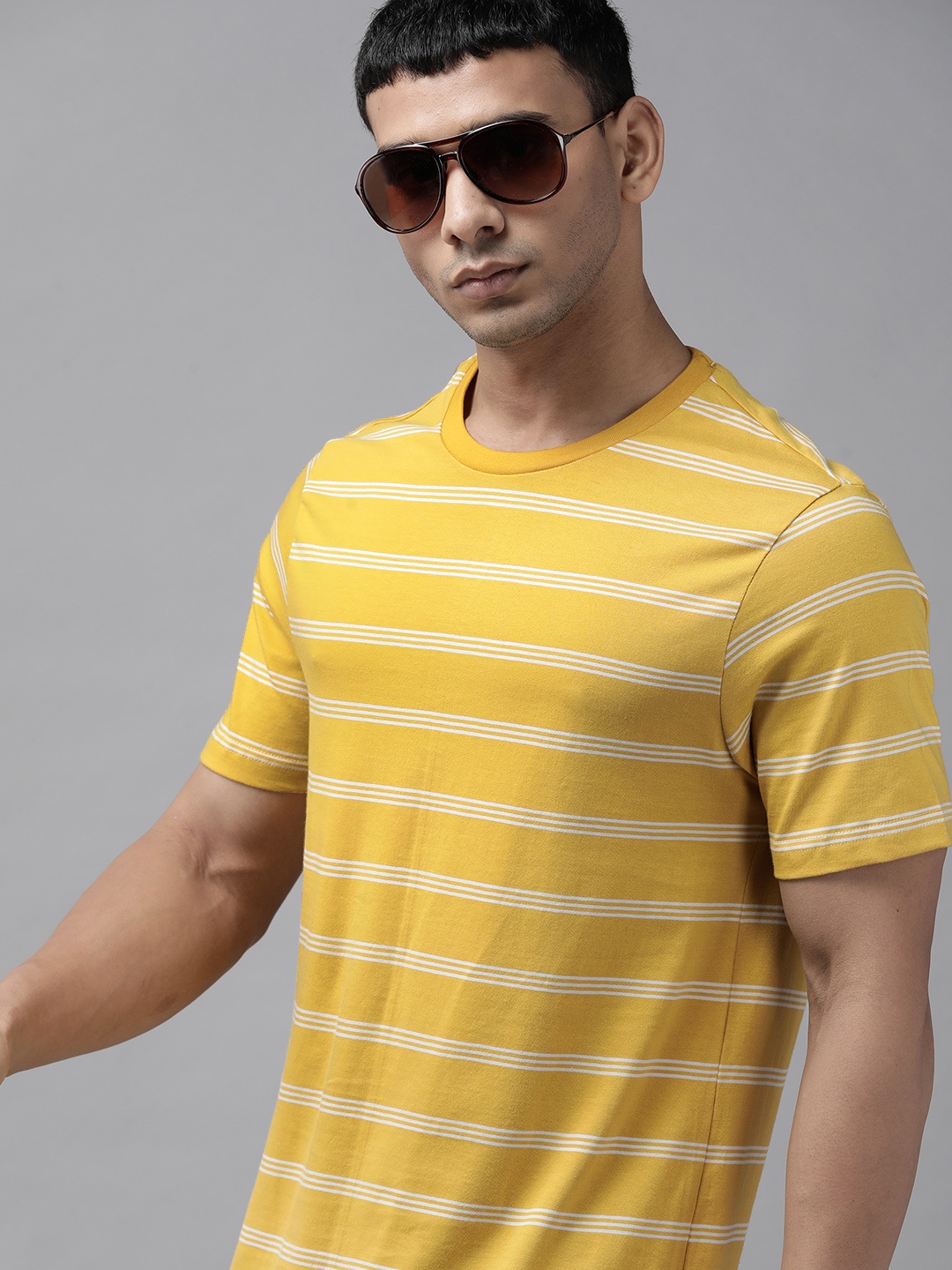 

Roadster Men Yellow & White Striped Pure Cotton T-shirt