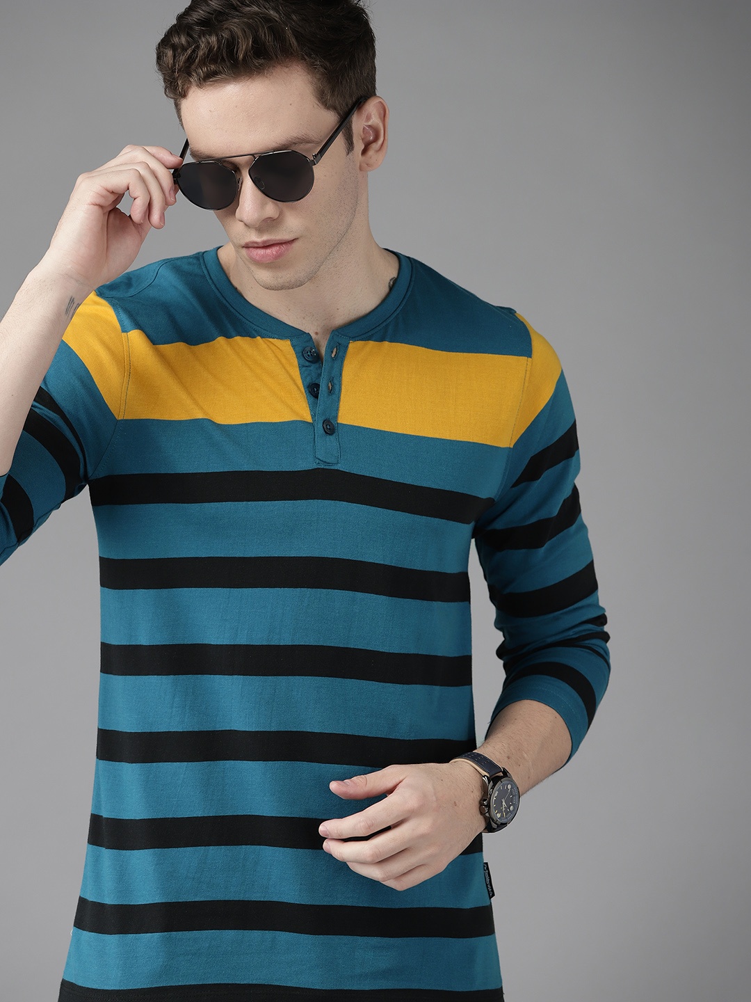 

Roadster Men Teal & Mustard Yellow Pure Cotton Striped Henley Neck T-shirt