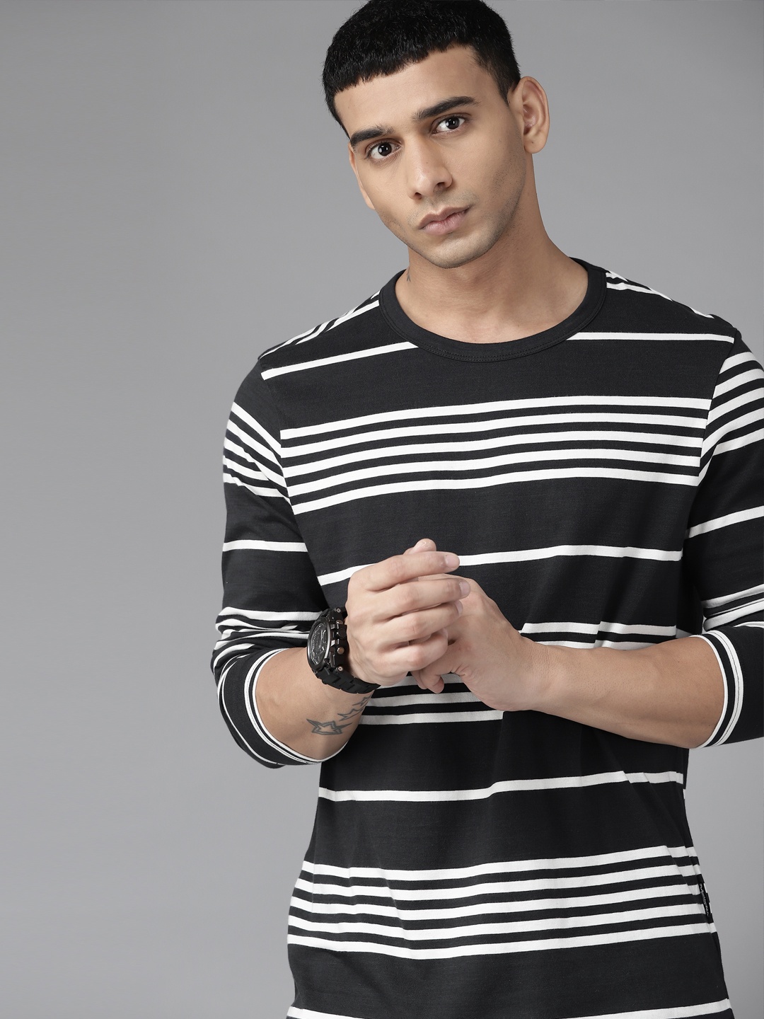 

Roadster Men Black & White Striped Pure Cotton T-shirt