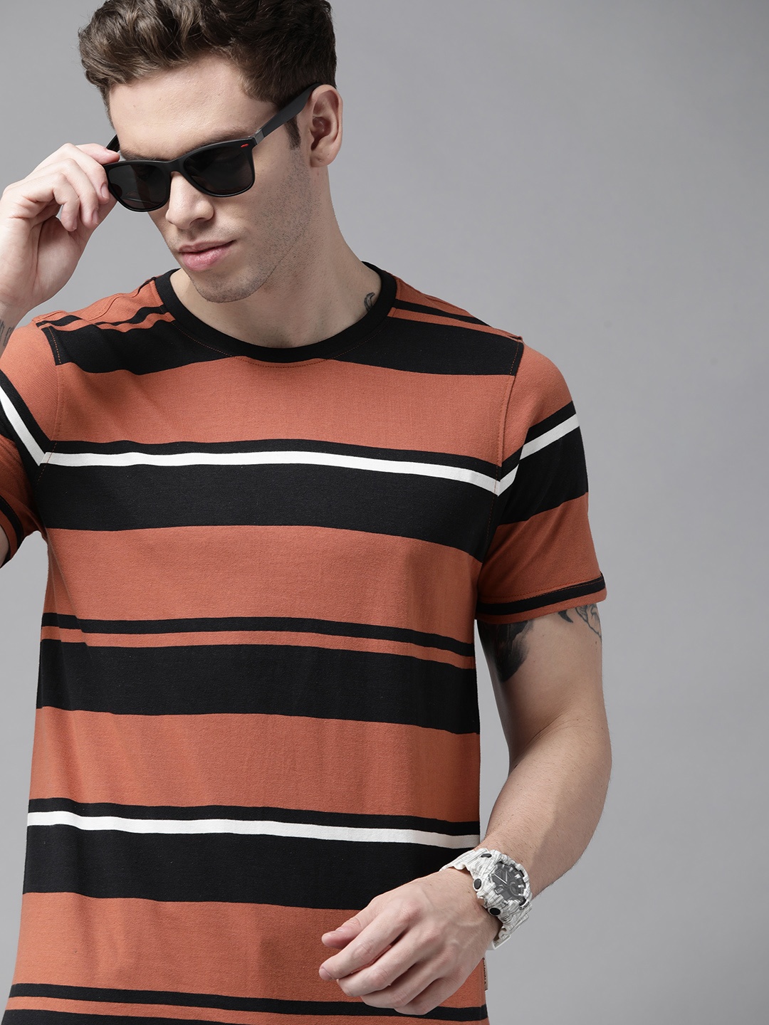 

Roadster Men Rust Red & Black Striped Pure Cotton T-shirt
