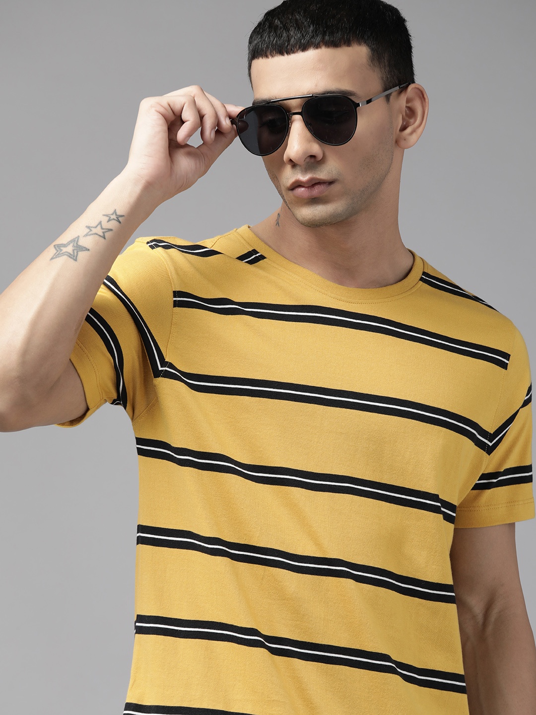 

The Roadster Lifestyle Co. Men Mustard Yellow & Black Striped Pure Cotton T-shirt