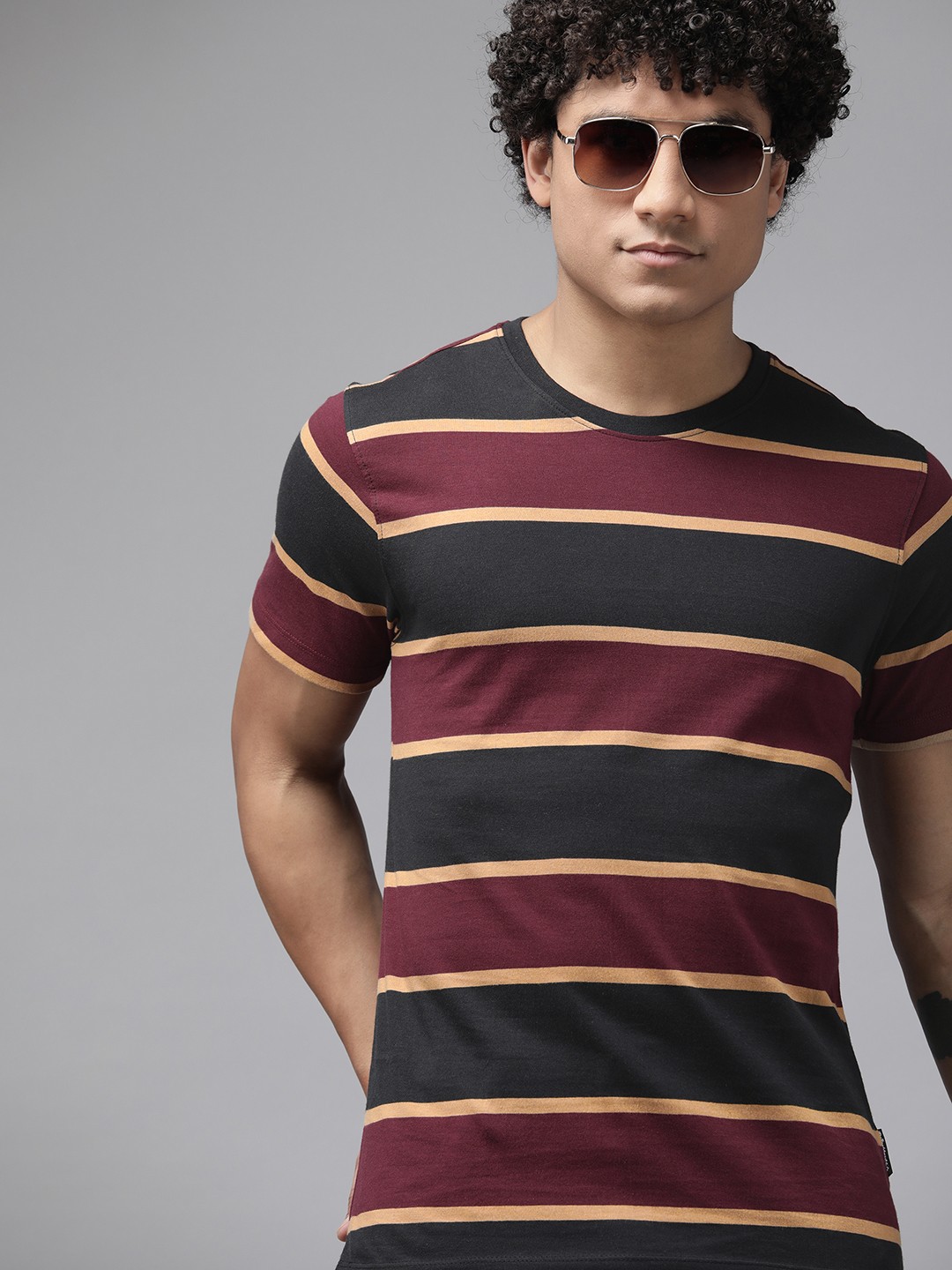 

The Roadster Lifestyle Co. Men Striped Pure Cotton T-shirt, Black