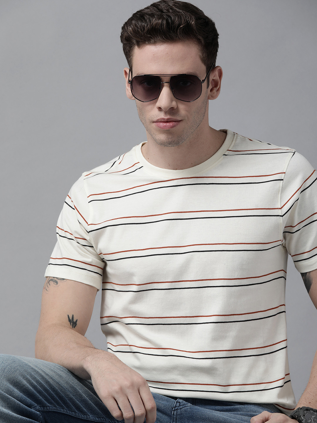 

Roadster Men Off White & Rust Striped Pure Cotton T-shirt