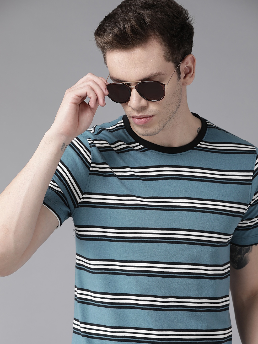 

Roadster Men Blue & White Striped Pure Cotton T-shirt