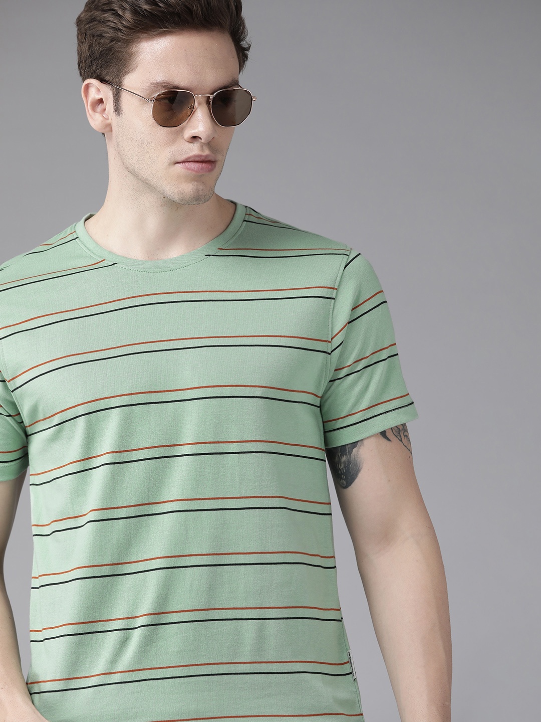 

Roadster Men Green & Black Striped Pure Cotton T-shirt