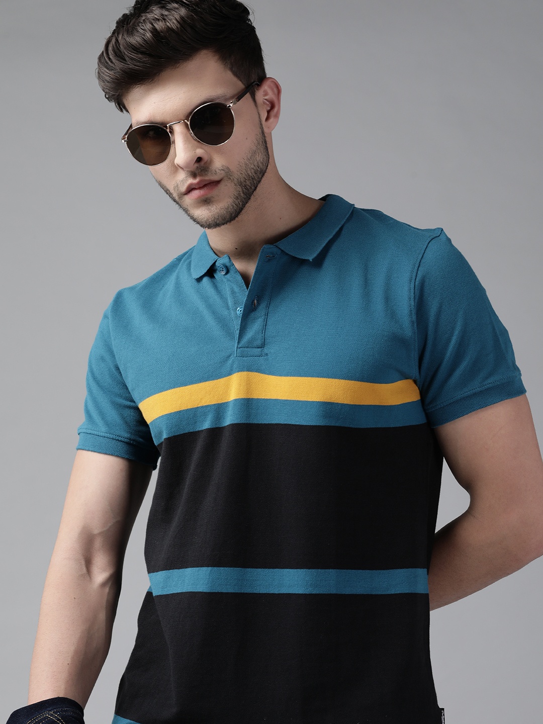 

Roadster Men Navy Blue & Black Pure Cotton Colourblocked Polo Collar T-shirt