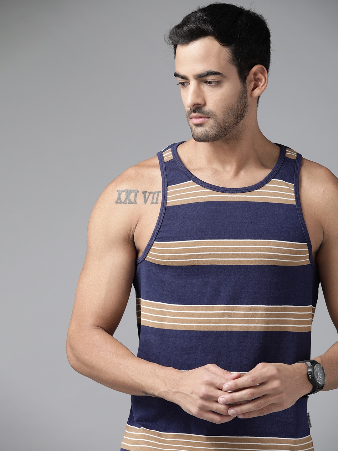 

Roadster Men Navy Blue & Khaki Striped Pure Cotton T-shirt