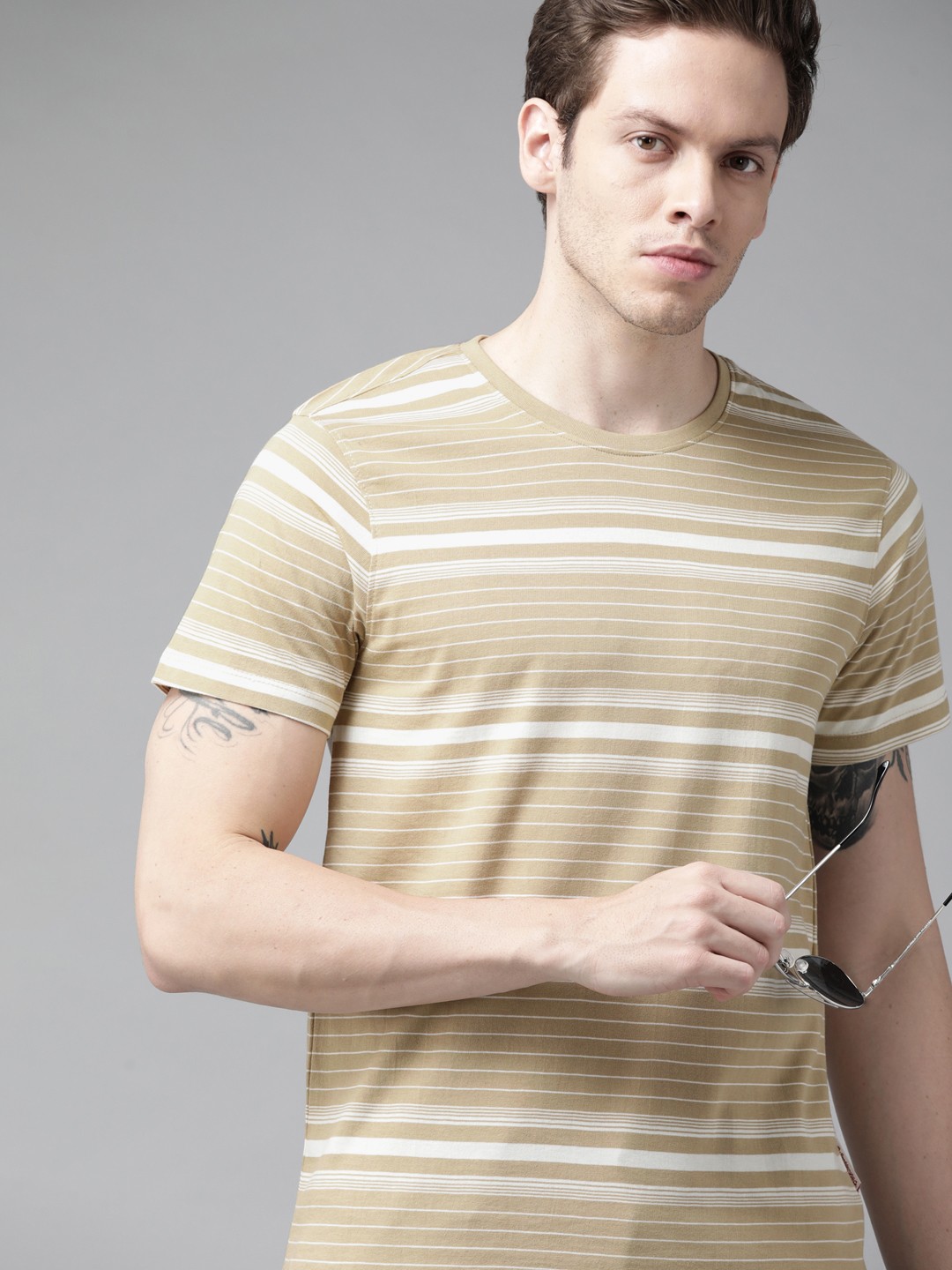 

Roadster Men Khaki & White Striped Pure Cotton T-shirt