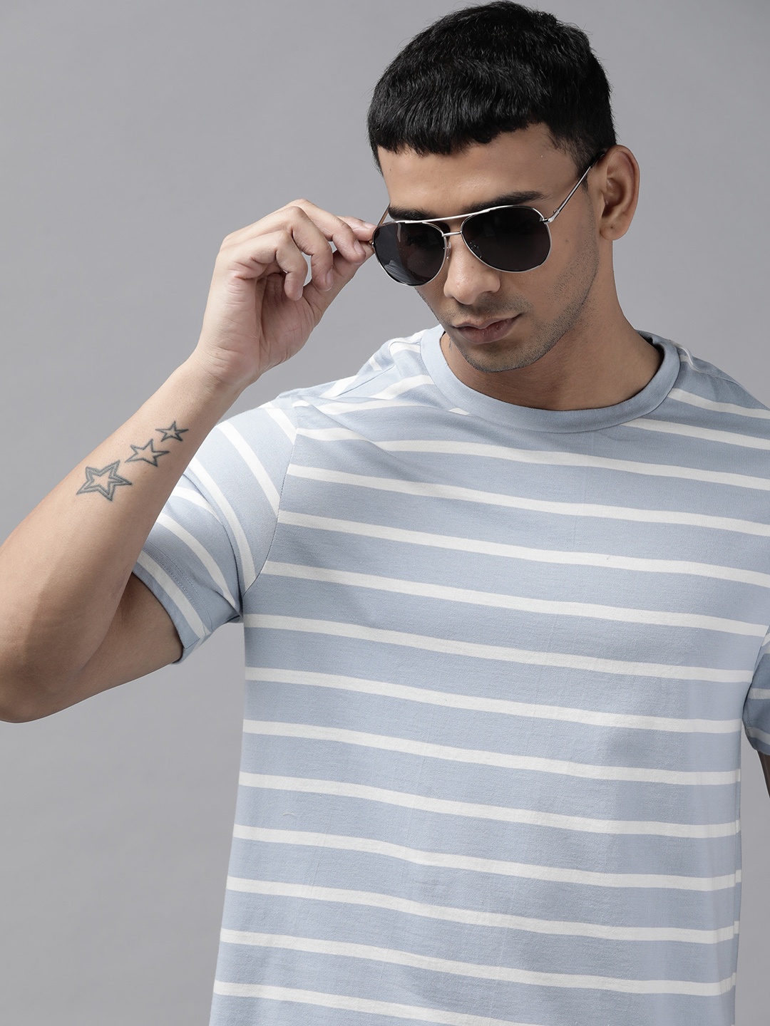 

Roadster Men Blue & White Striped Pure Cotton T-shirt