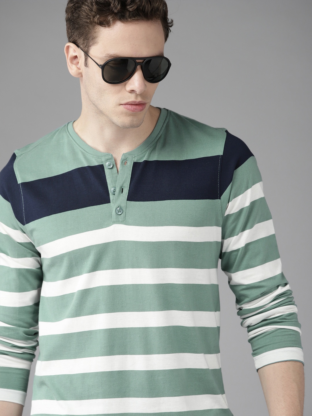 

Roadster Men Teal Blue & White Striped Pure Cotton T-shirt
