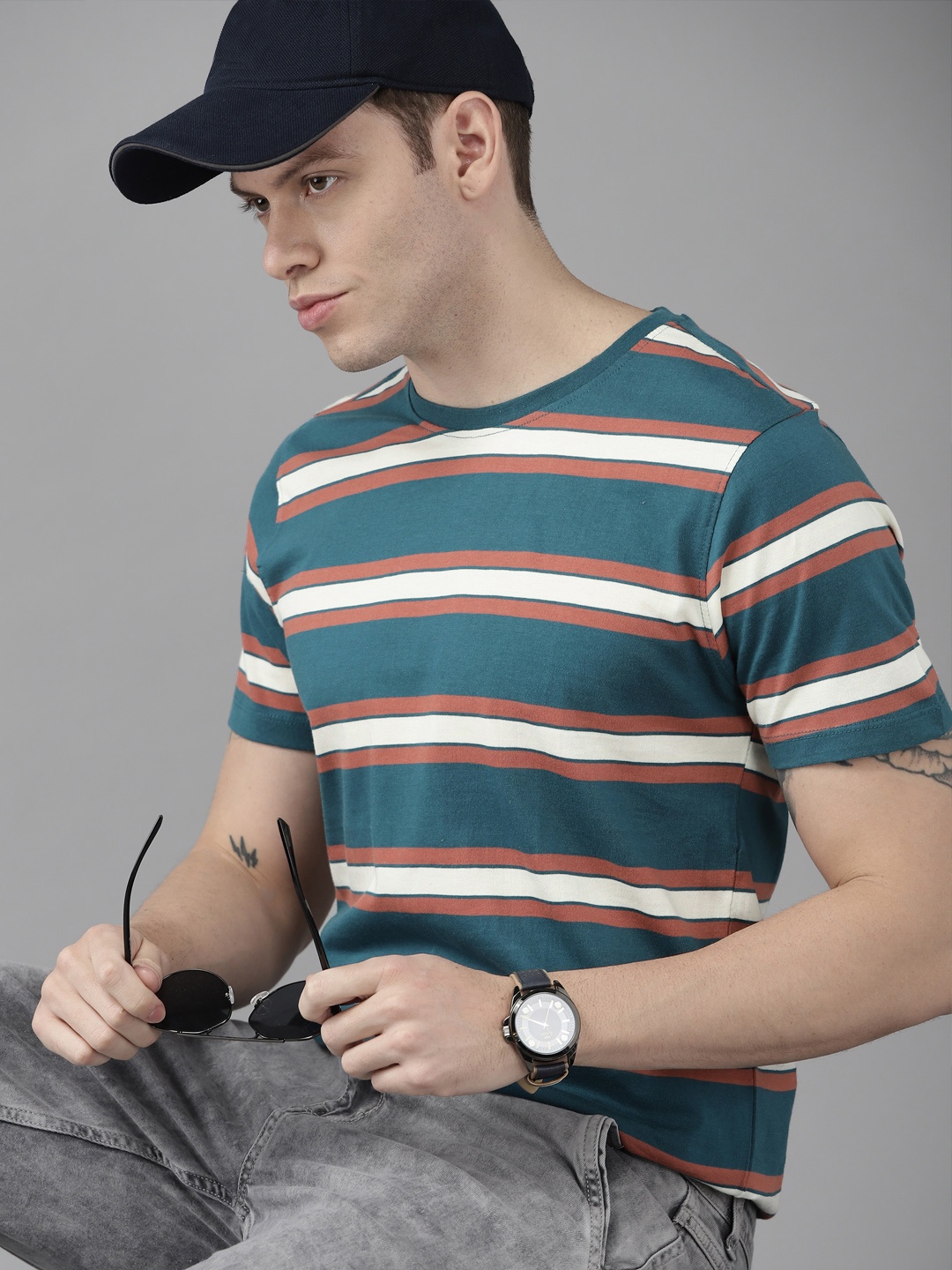 

Roadster Men Blue & Off White Striped Pure Cotton T-shirt