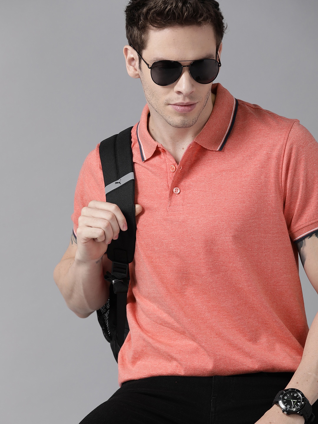 

Roadster Men Coral Red Solid Polo Collar T-shirt