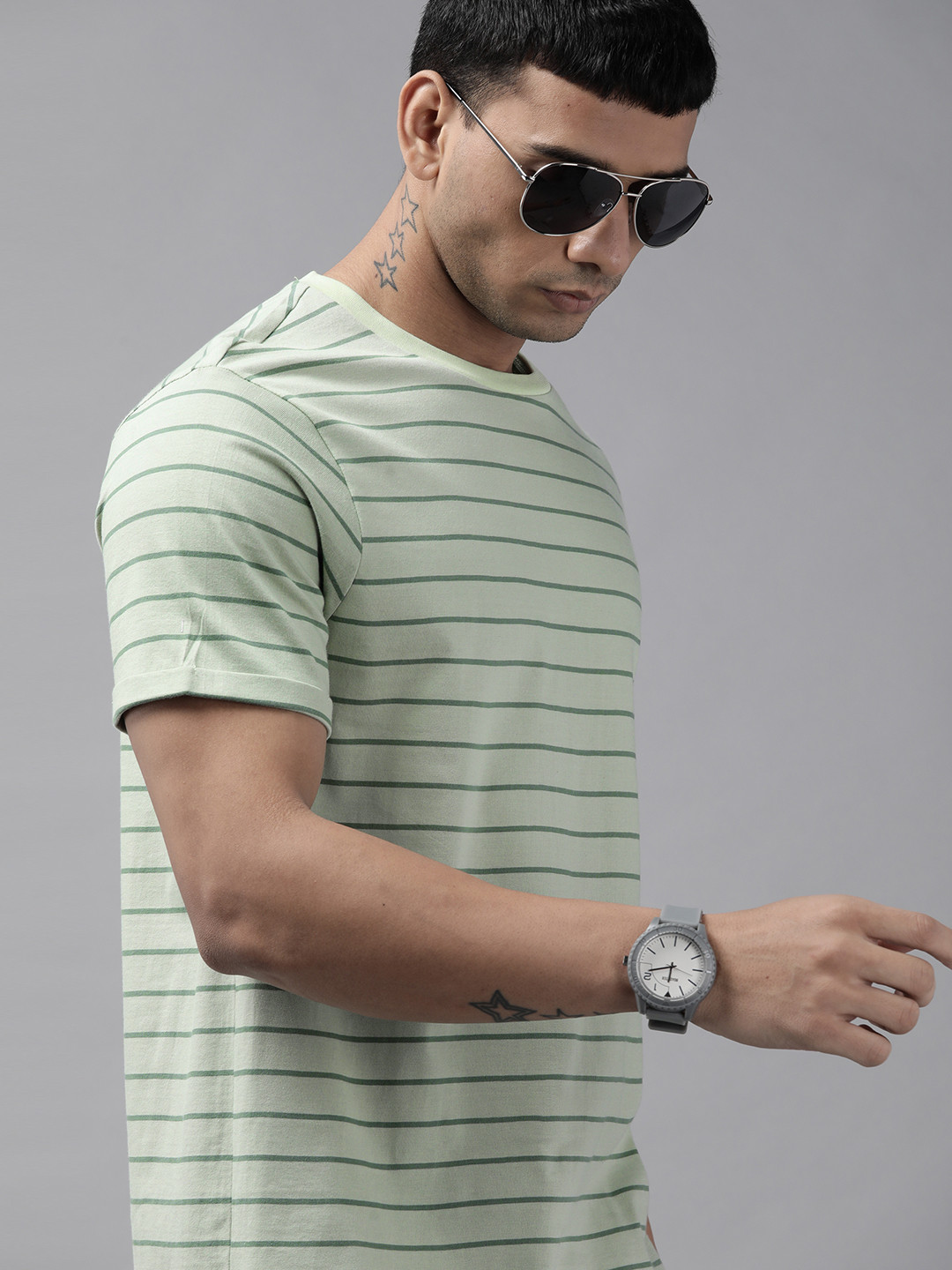 

Roadster Men Green & White Striped Pure Cotton T-shirt