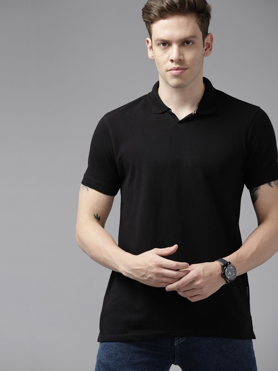 

Roadster Men Black Polo Collar Pure Cotton T-shirt