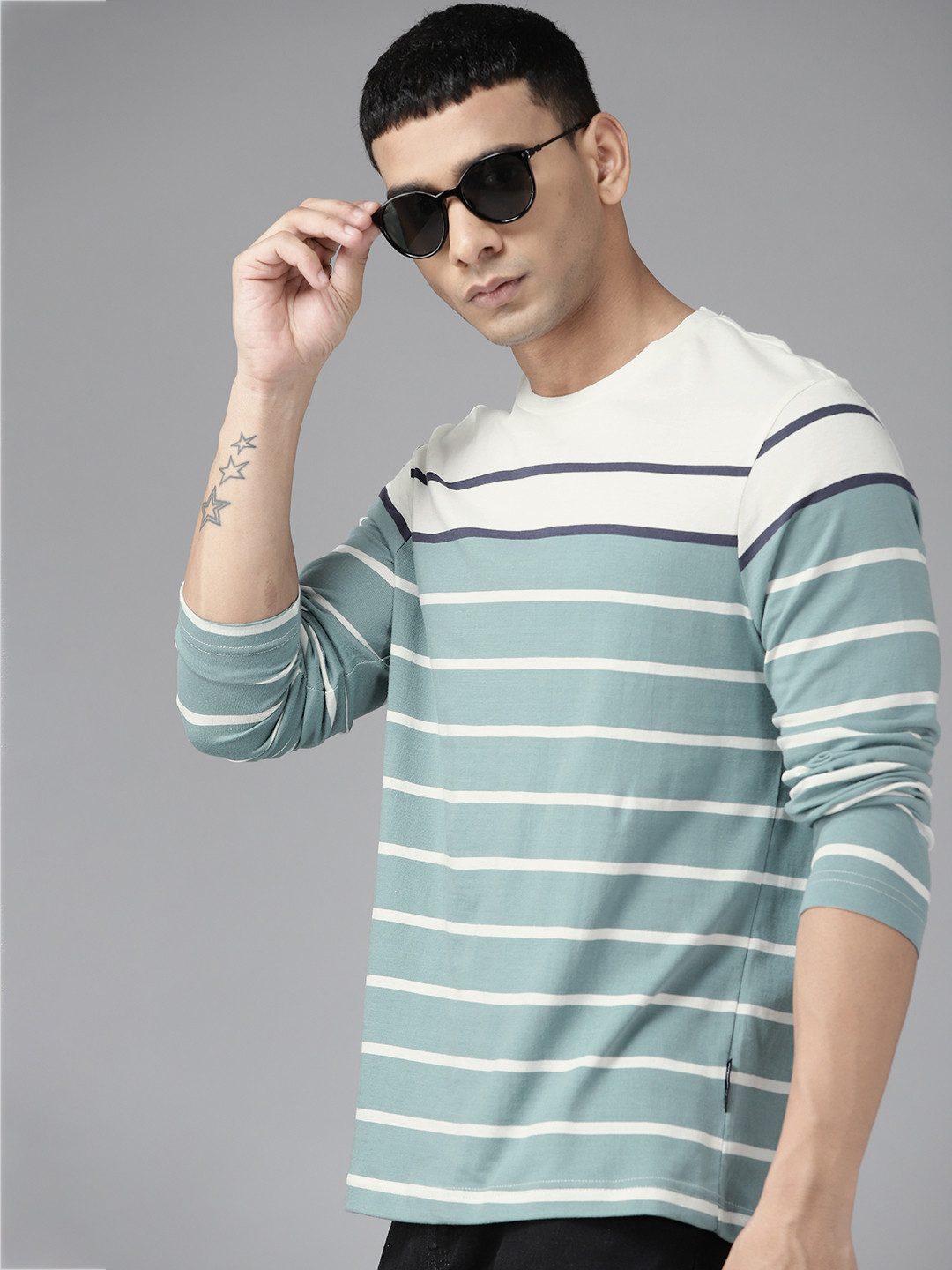 

Roadster Men Off White & Blue Striped Pure Cotton T-shirt