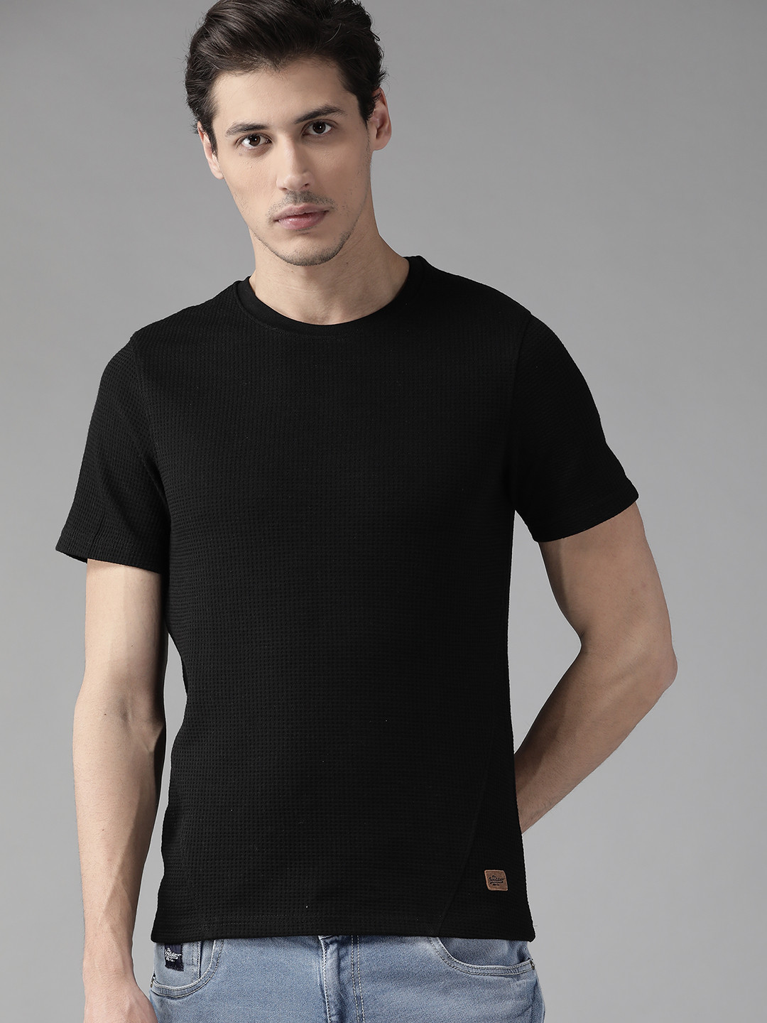 

The Roadster Lifestyle Co Men Black Solid Waffle Texture T-shirt