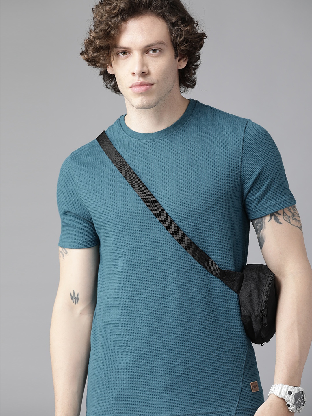 

Roadster Men Teal Blue Waffle Texture T-shirt