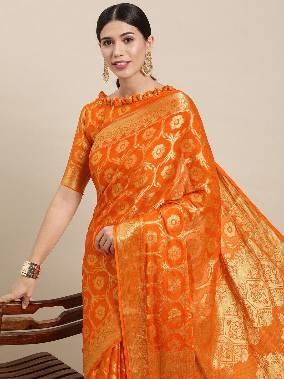 

Mitera Orange & Gold-Toned Ethnic Motifs Zari Silk Blend Saree