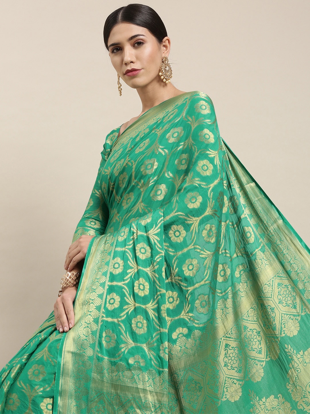 

Mitera Green & Gold Ethnic Motifs Zari Silk Blend Saree
