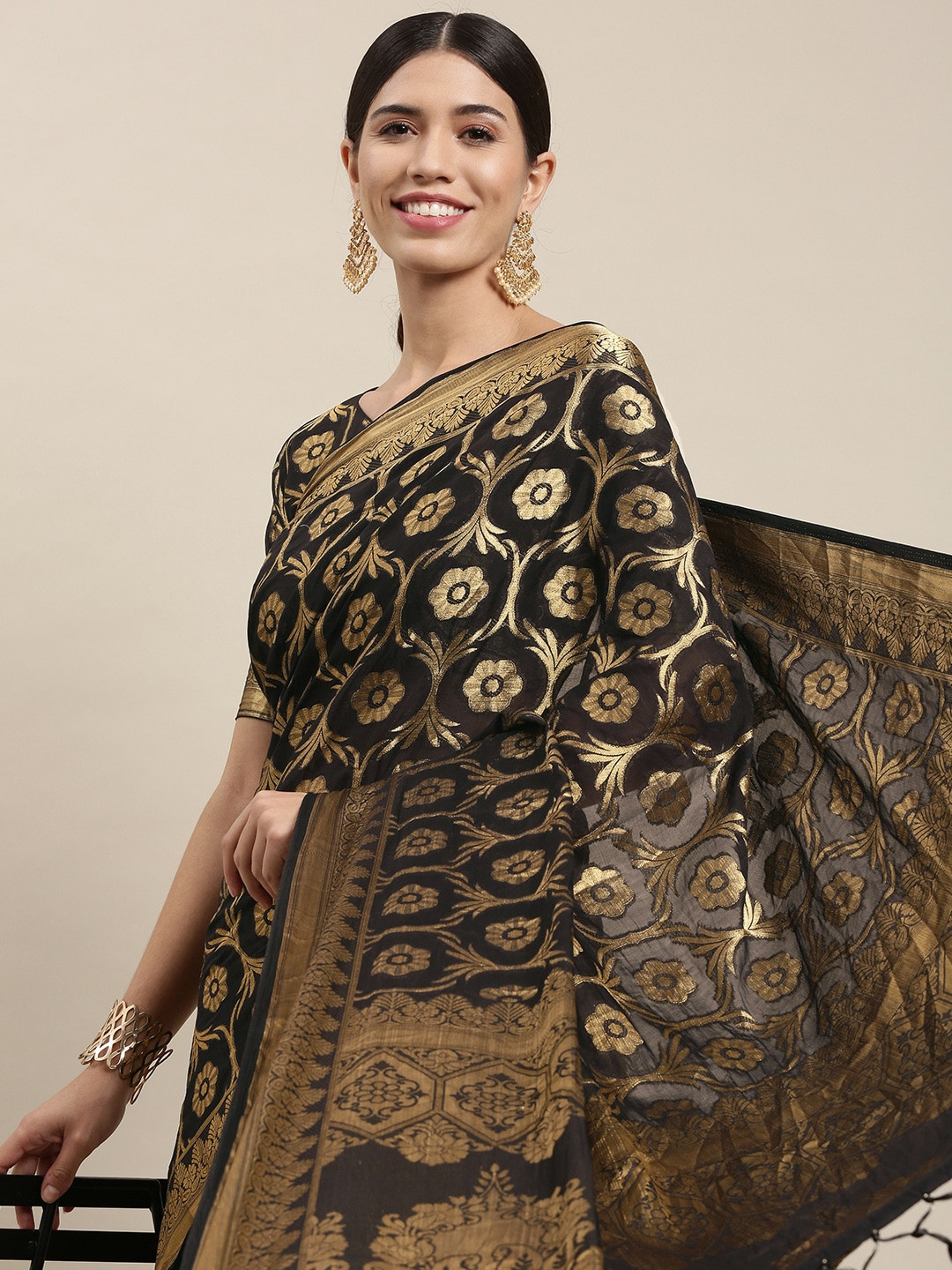 

Mitera Black & Gold Ethnic Motifs Zari Silk Blend Saree