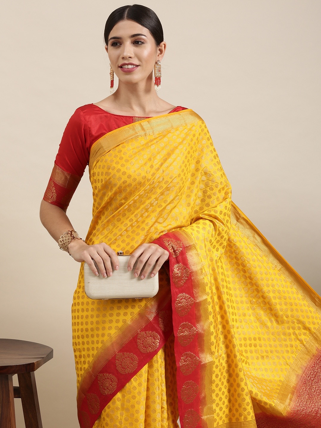 

Mitera Mustard Yellow & Gold Ethnic Motifs Zari Silk Blend Saree
